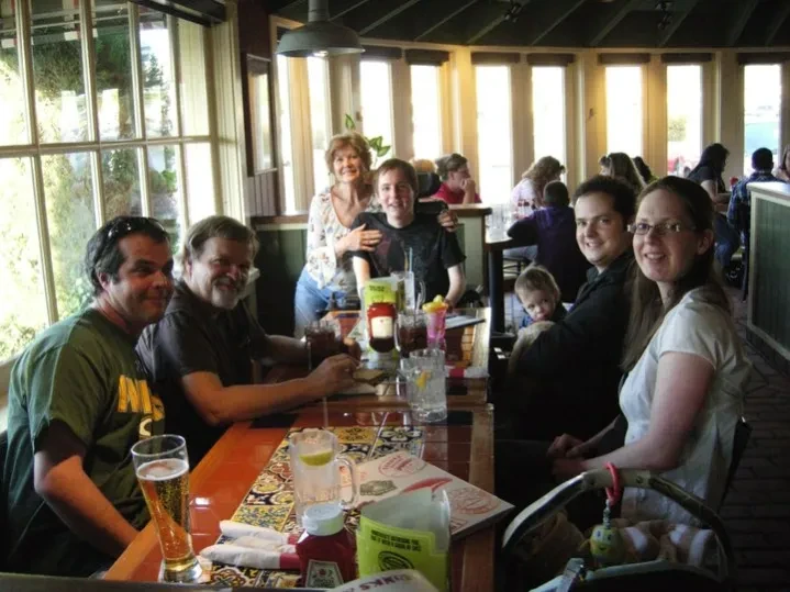 Family enjoying a meal together at a restaurant